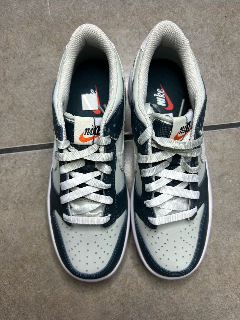 Nike Low-Top Sneakers in White and Dark Teal with Orange Accents